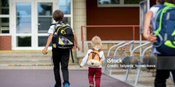 School children, boys, going back to school after the summer vacation, kids going to school
