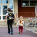 School children, boys, going back to school after the summer vacation, kids going to school