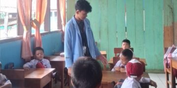 mengajar di SD negeri 1 pajar bulan