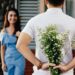 Photo by Vija Rindo Pratama: https://www.pexels.com/photo/man-holding-baby-s-breath-flower-in-front-of-woman-standing-near-marble-wall-935789/