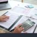 stock photo internal tax audit review checking esg data risk in balance sheet prepare annual report gaap ifrs 2511448813