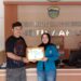 Serah terima Aplikasi Sipade oleh Perwakilan Mahasiswa Bina Sarana Informatika Kelompok Bismillah dengan desa Setiawaras Tasikmalaya