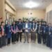 Tim KKN 166 UNS melakukan sesi foto bersama dengan lurah setempat.