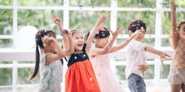 Happy child with Friendship in carnival party or Celebration Party birthday or New Year Christmas