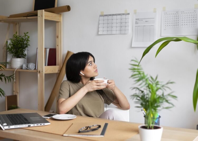 medium shot woman holding coffee cup 1