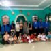 Mahasiswa UBSI foto bersama anak-anak Yayasan Al-Ihya setelah kegiatan pengabdian masyarakat pelatihan public speaking.