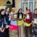 Pemberian booklet kepada masyarakat yang hadir pada kegiatan sosialisasi