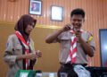 Anggota Saka POM Bima Melaksanakan Praktek Uji Cepat Bahan Berbahaya pada Makanan