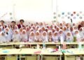 Dokumentasi mahasiswa/i Telkom University dan siswi di SDIT Imam Bukhari (Sumber: Dokumentasi Pribadi)