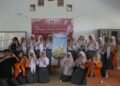 Grantha Dayatina: Dari Kampus ke Sekolah, Remaja Putri Belajar Cintai Diri Sendiri 47 Foto bersama peserta kegiatan edukasi di SMAN 12 Kota Jambi (Sumber: Dokumentasi Pribadi)