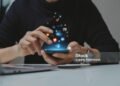 Hand of young business using smartphone, Social media concept