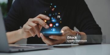 Hand of young business using smartphone, Social media concept