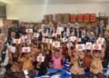 Dokumentasi mahasiswa KKN Universitas Negeri Padang (UNP) saat melaksanakan program Pilar Pencegahan Stunting (Sumber: Dokumentasi Pribadi)