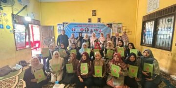 Pelatihan Guru PAUD dalam Pengembangan Buku Cerita Digital Berbasis Wisata dan Budaya Lokal untuk Literasi Calistung di Desa Ibul Besar 56 Foto bersama tim dosen Universitas Sriwijaya dan para peserta pelatihan guru