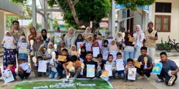 Mahasiswa KKN USK Kelompok XXIX-212 Semarakkan Hari Anak Nasional Melalui Berbagai Perlombaan Edukatif di Desa Cot Rabo Tunong 57 Foto bersama sesudah pembagian hadiah (Sumber: Dokumentasi panitia publikasi dan dokumentasi)