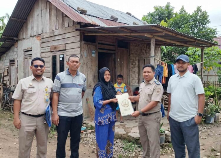 Wujudkan Keadilan Agraria, Kantah Kota Lhokseumawe Serahkan Sertipikat PTSL bagi Masyarakat Berpenghasilan Rendah di Gampong Baloy