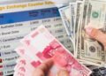 Ilustrasi pertukaran rupiah dan dolar AS yang menggambarkan fluktuasi nilai tukar dalam transaksi valuta asing.
Sumber: Bank Indonesia, Indonesia Economic Report 2015, bagian Domestic Economy.